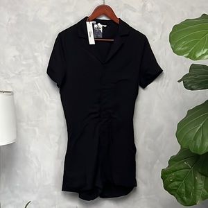 LBLC NWT Black One piece Short Sleeve, V Neck Jumpsuit, Size S